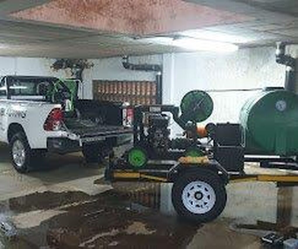 Jet blasting of drain in basement