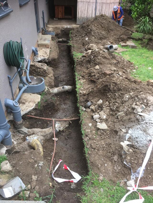 Remove old poorly installed sewer system to make place for new
