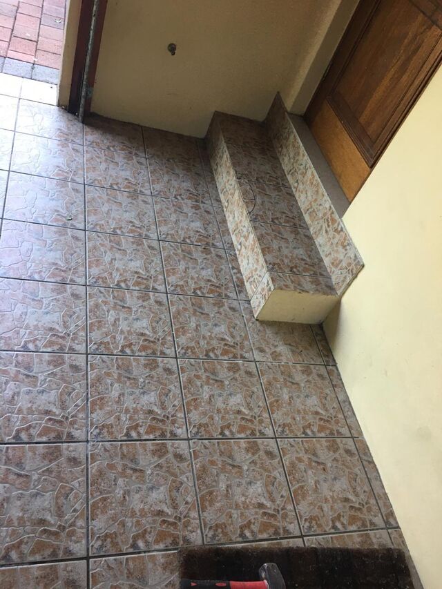 AFTER Burst pipe tiling repaired